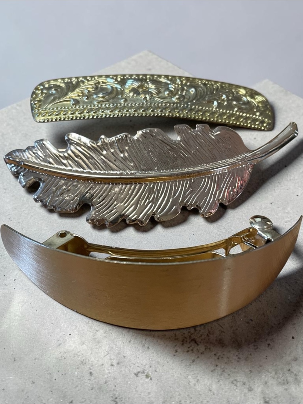 Three vintage French style barrettes, gold tone, lightweight